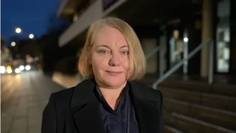 Shaun Whitmore/BBC Julia Hopper outside Essex Coroner's Court