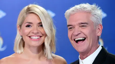 PA Media Holly Willoughby (left) and Phillip Schofield attending the launch of Dancing On Ice 2020, held at Bovingdon Airfield, Hertfordshire