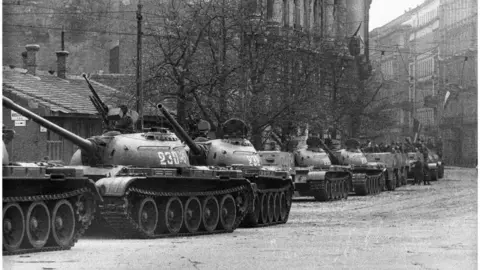 Getty Images A line of Russian tanks in Budapest during the army's supression of the 1956 anti-communist uprising