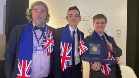 Michael Jones, Callum and James win prize at Cop28 in Dubai