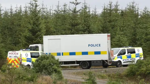 PA Media Police vehicles in Galloway Forest