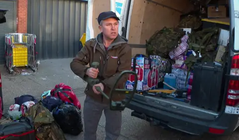 Viktor demonstrates a mine detector