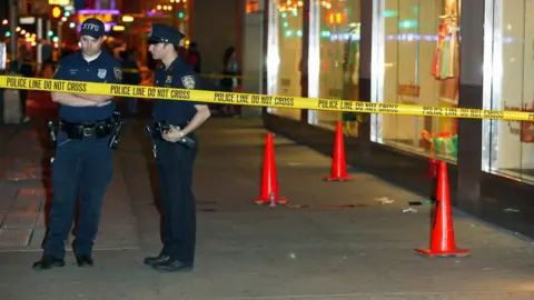 Getty Images Picture showing New York Policemen outside a crime scene