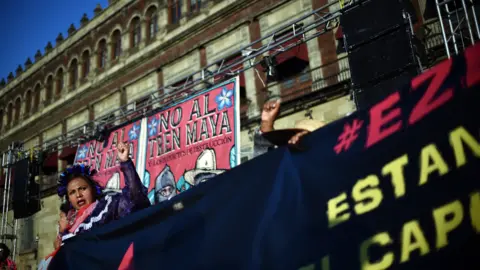  RODRIGO ARANGUA/AFP/Getty Images Zapatista movement protest at Maya Train, Mexico City, January 2019