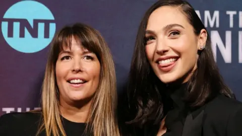 Getty Images Wonder Woman director Patty Jenkins (left) with actress Gal Gadot