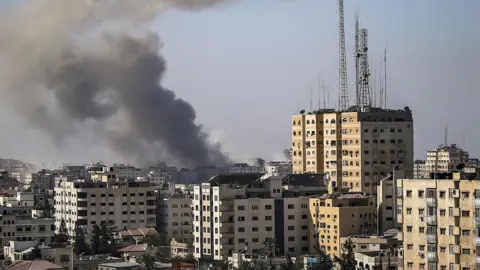EPA Smoke rises following Israeli airstrikes on Gaza City