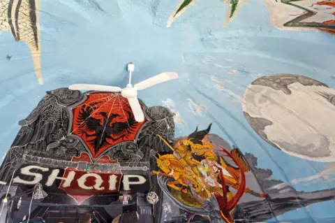 Robert Hackman Interior view of a bunker in Albania with a painted roof