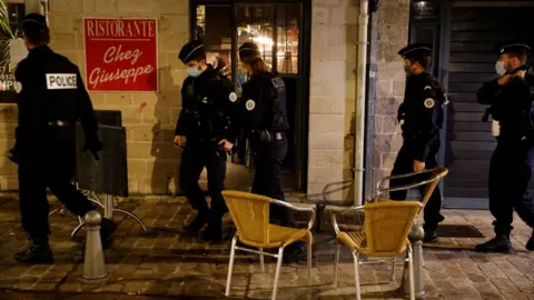 Reuters Police patrol the streets of Lille