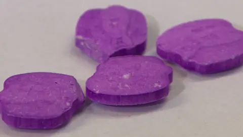 Purple pills