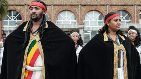 AFP Ethiopians in traditional dress waiting at an airport in Gondar, Ethiopia - Friday 9 November 2018