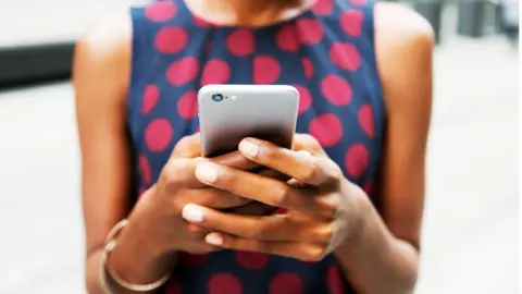 Getty Images Woman on smartphone