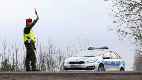 Getty Images Journalists and aid workers are barred from reaching the border area under Poland's state of emergency