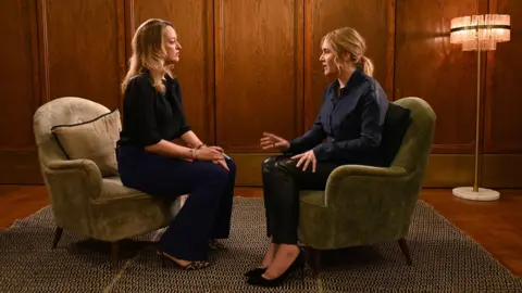 Jeff Overs/BBC Laura Kuenssberg (l) and Kate Winslet