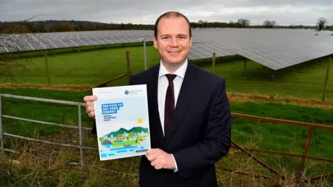 Department for the Economy  Economy Minister Gordon Lyons launched "the path to net zero energy" strategy on Thursday