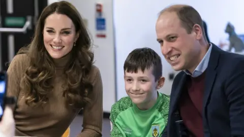 PA Media The Duke and Duchess of Cambridge meet Carole Ellis and her great grandson Deacon Glover,11, whose mother, Grace Taylor has passed away, during a visit to charity, Church on the Street, in Burnley, Lancashire,