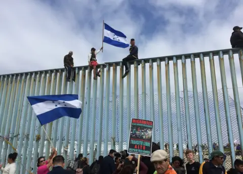 BBC Protesters gather at the US-Mexico border fence at a beach in Tijuana, Mexico, 29 April 2018