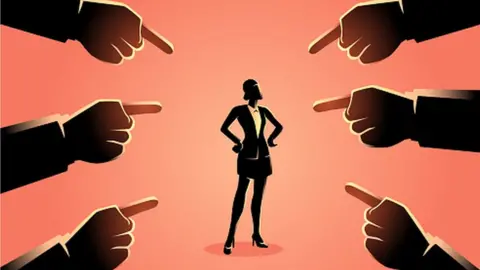 Getty Images Fingers being pointed at a woman