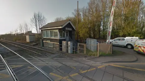 Google King's Dyke level crossing