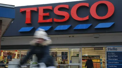 Getty Images Blurred figure in front of Tesco