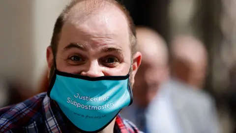 Getty Images Protestor outside courts