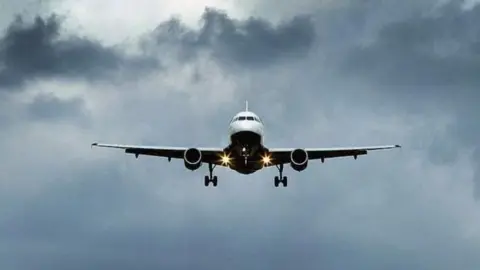 Getty Images Plane landing at Heathrow Airport