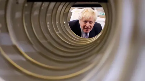 Getty Images Boris Johnson on a campaign visit to a factory in Newton Aycliffe (20 Nov)