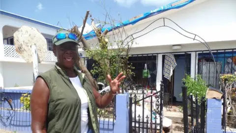 Gemma Handy Myra Askie has been cleaning her 75-year-old mother’s home so she can return to Barbuda