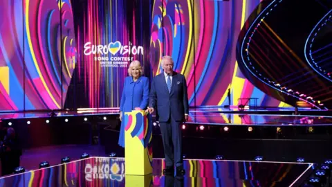 Reuters King Charles and Camilla, Queen Consort switch on stage lighting as they visit the host venue of this year's Eurovision Song Contest, the M&S Bank Arena in Liverpool