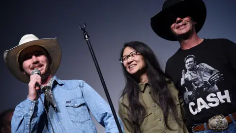 Getty Images Zhao with Brady and Tim Jandreau, who starred in her 2017 film The Rider