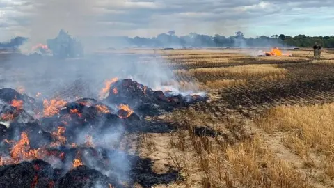 Fires burning in parts of a field