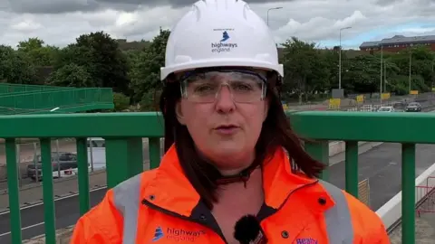 Female engineer on bridge