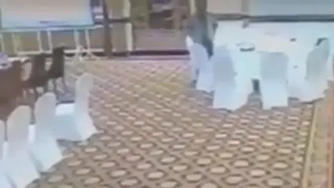 YouTube CCTV footage shows a figure taking a wallet from the table