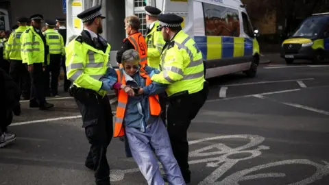 Reuters Protester arrested by police