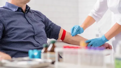 Getty Images Man giving blood donation