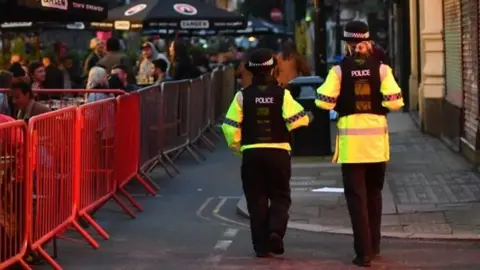 Getty Images Police officers patrolling