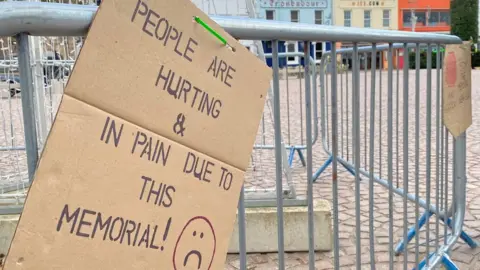 BBC Abuse memorial protest placard