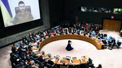 Getty Images Ukrainian President Volodymyr Zelensky addresses a UN Security Council meeting in New York, 4 April 2022