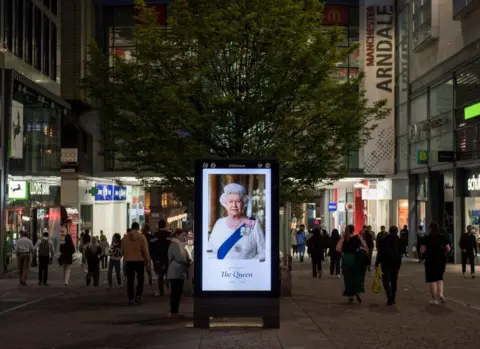 Getty Images A digital advertising board on Market Street in Manchester shows an image of Queen Elizabeth II