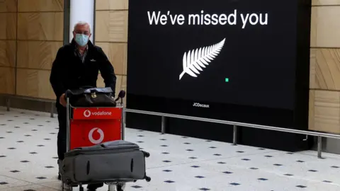 Reuters A passenger from New Zealand arriving at Sydney Airport terminal last October