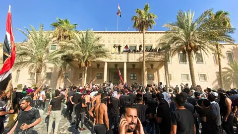 Supporters storm palace in Iraq's capital Baghdad