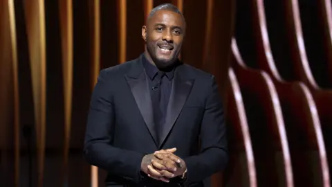 Getty Images Idris Elba speaks onstage during the 30th Annual Screen Actors Guild Awards at Shrine Auditorium and Expo Hall on February 24, 2024 in Los Angeles, California. (