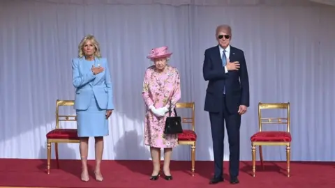 Getty Images Joe Biden and First Lady Jill Biden with the Queen