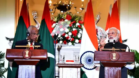 Getty Images Prime Minister Narendra Modi (R) and Maldives' President Ibrahim Mohamed Solih attend the joint media briefing and MoU signing at the Hyderabad House on August 2, 2022 in New Delhi, India.