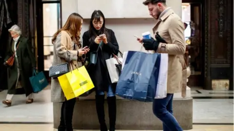 AFP Shoppers on Oxford St