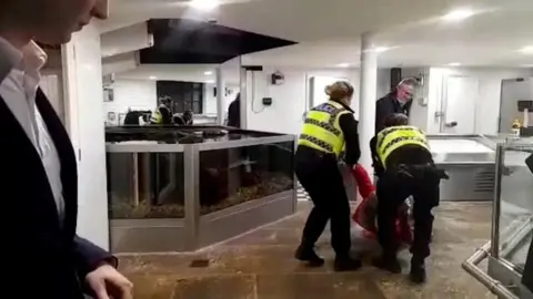 Animal Rebellion Emma Smart with police