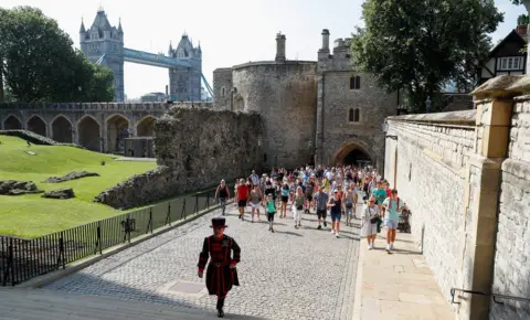 Reuters A Yeoman Warder, Barney Chandler leads the first "Beefeater" tour of the Tower of London in 16 months,