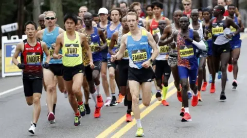 Reuters Runners competing at the Boston Marathon on Monday 15 April