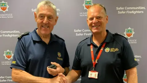 Humberside Fire and Rescue Service Ian Johnson with chief fire officer Phil Shillito