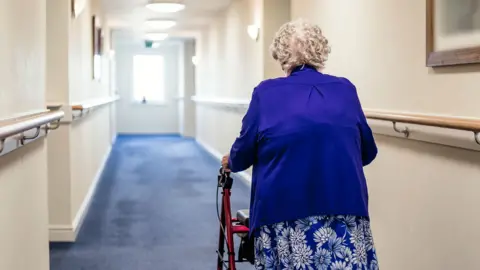 Getty Images A woman in a care home