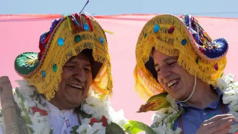 Reuters Bolivia's former President Evo Morales and former vice president Alvaro Garcia Linera react during a caravan between Uyuni and Oruro, upon his return to the country, in Uyuni, Bolivia November 10, 2020.